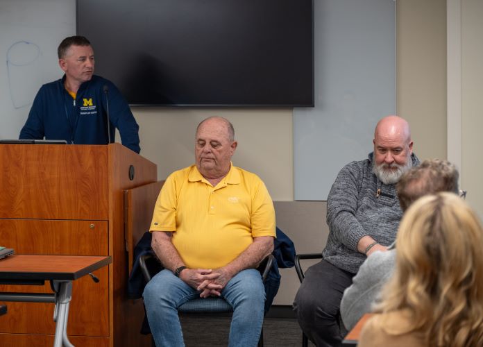 Chad Abbott, RN, speaks about the Paired Donations Program as kidney recipient  Bob Denham and kidney donor Doug Zawisza Kidney Donor listen.